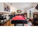Game room boasts a pool table, bar, and seating area at 20255 Macon Ln, Port Charlotte, FL 33952