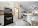 Kitchen features stainless steel appliances and ample cabinetry at 20255 Macon Ln, Port Charlotte, FL 33952