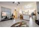 Open concept living room offers views of the kitchen and dining areas at 20255 Macon Ln, Port Charlotte, FL 33952