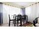 Bright sunroom with dining table and seating area at 20255 Macon Ln, Port Charlotte, FL 33952