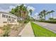 Community entrance sign with lush tropical landscaping at Heritage Isles Golf and Country Club at 219 Heritage Isles Way, Bradenton, FL 34212