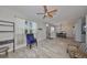 Inviting living room showcases an open floor plan with stylish furnishings and wood-look floors at 219 Heritage Isles Way, Bradenton, FL 34212