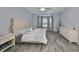 Tranquil bedroom offers a spacious layout with a large bay window and decor at 219 Heritage Isles Way, Bradenton, FL 34212
