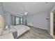 This main bedroom is filled with natural light from the bay window and includes an en suite bathroom at 219 Heritage Isles Way, Bradenton, FL 34212