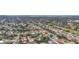 Aerial view of residential neighborhood, showcasing homes and landscape at 2523 Darwin Ave, Sarasota, FL 34239