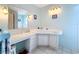 Bright bathroom with vanity, sink, and shower at 2523 Darwin Ave, Sarasota, FL 34239