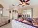 Bedroom with queen bed, wood furniture and access to patio at 2523 Darwin Ave, Sarasota, FL 34239