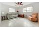 Bright bedroom with a comfortable seating area at 2523 Darwin Ave, Sarasota, FL 34239