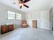 Spacious bedroom with ceiling fan and ample space at 2523 Darwin Ave, Sarasota, FL 34239