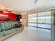 Living room with view of screened patio and backyard at 2523 Darwin Ave, Sarasota, FL 34239