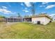 Backyard view showcasing pool, patio, and house at 3121 Mohawk St, Sarasota, FL 34231