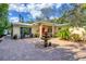 Courtyard with fountain and seating area near the entrance at 3414 Old Oak Dr, Sarasota, FL 34239