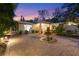 Brick paved courtyard with fountain and seating area at 3414 Old Oak Dr, Sarasota, FL 34239