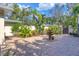 Attractive courtyard with fountain and lush landscaping at 3414 Old Oak Dr, Sarasota, FL 34239