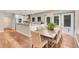 Bright kitchen features an island, stainless steel appliances, and terracotta tile floors at 3414 Old Oak Dr, Sarasota, FL 34239