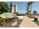 Siesta Key Village entrance sign and pathway, leading to shops and restaurants at 3414 Old Oak Dr, Sarasota, FL 34239