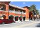 Street-level view of shops and restaurants in a vibrant commercial area at 3414 Old Oak Dr, Sarasota, FL 34239