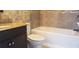 Clean bathroom with granite countertop and tub shower at 3606 Beneva Rd # 502, Sarasota, FL 34232