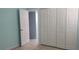 Light and airy bedroom with large closet and light teal walls at 3606 Beneva Rd # 502, Sarasota, FL 34232