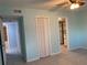 Bright bedroom with private bathroom access and tile floors at 3606 Beneva Rd # 502, Sarasota, FL 34232