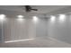Living room with tiled floors, recessed lighting, and sliding glass doors at 3606 Beneva Rd # 502, Sarasota, FL 34232