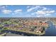 Aerial view of a waterfront community, showcasing numerous buildings and boat slips at 3920 Bal Harbor Blvd # E1, Punta Gorda, FL 33950