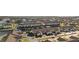 Aerial view of waterfront community with multiple buildings, boat slips, and parking at 3920 Bal Harbor Blvd # E1, Punta Gorda, FL 33950