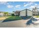 Attractive two-car garage and well-maintained lawn at 3920 Bal Harbor Blvd # E1, Punta Gorda, FL 33950