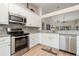 Modern kitchen with stainless steel appliances at 3920 Bal Harbor Blvd # E1, Punta Gorda, FL 33950