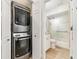 Convenient laundry room with stackable washer and dryer at 3920 Bal Harbor Blvd # E1, Punta Gorda, FL 33950