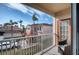 Spacious balcony with view of building and parking lot at 3980 Mediterranea Cir # 522, Sarasota, FL 34233