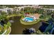 Community pool and clubhouse with lake at 435 30Th W Ave # D309, Bradenton, FL 34205