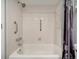 Clean bathroom with shower/tub combo at 435 30Th W Ave # D309, Bradenton, FL 34205