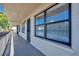 Condo hallway with access to individual units and a balcony at 435 30Th W Ave # D309, Bradenton, FL 34205