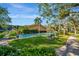 Community shuffleboard court with benches and lush landscaping at 435 30Th W Ave # D309, Bradenton, FL 34205