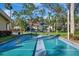 Community shuffleboard court with benches and lush landscaping at 435 30Th W Ave # D309, Bradenton, FL 34205
