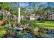 Relaxing water feature with lush landscaping and building view at 435 30Th W Ave # D309, Bradenton, FL 34205