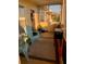 Screened porch with seating and potted plants at 4802 51St W St # 1106, Bradenton, FL 34210