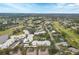 Community overview with surrounding landscape at 5128 Marsh Field Ln # 129, Sarasota, FL 34235