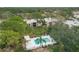 Complex with pool and lush landscaping at 5128 Marsh Field Ln # 129, Sarasota, FL 34235