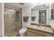 Clean bathroom with a large walk-in shower and updated vanity at 5128 Marsh Field Ln # 129, Sarasota, FL 34235