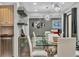 Stylish dining area, featuring a glass table and modern chandelier at 5128 Marsh Field Ln # 129, Sarasota, FL 34235