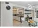 Bright eat-in kitchen with stainless steel appliances and white cabinetry at 5128 Marsh Field Ln # 129, Sarasota, FL 34235
