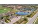 Aerial view of villas near golf course and pond at 5518 Palmer Cir # 105, Bradenton, FL 34211