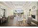 Spacious clubhouse interior with seating and fireplace at 5839 Helicon Pl, Sarasota, FL 34238