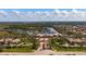 Aerial view of community with clubhouse and amenities at 5839 Helicon Pl, Sarasota, FL 34238