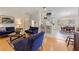 Living room, kitchen, and dining area with open floor plan at 5839 Helicon Pl, Sarasota, FL 34238