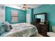 Spacious bedroom with coastal decor and a large bed at 6065 Worsham Ln # 104, Bradenton, FL 34211