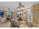 Open concept dining room with views into living room and kitchen at 6065 Worsham Ln # 104, Bradenton, FL 34211