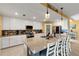 Spacious kitchen with granite countertops, stainless steel appliances, and an island at 6065 Worsham Ln # 104, Bradenton, FL 34211
